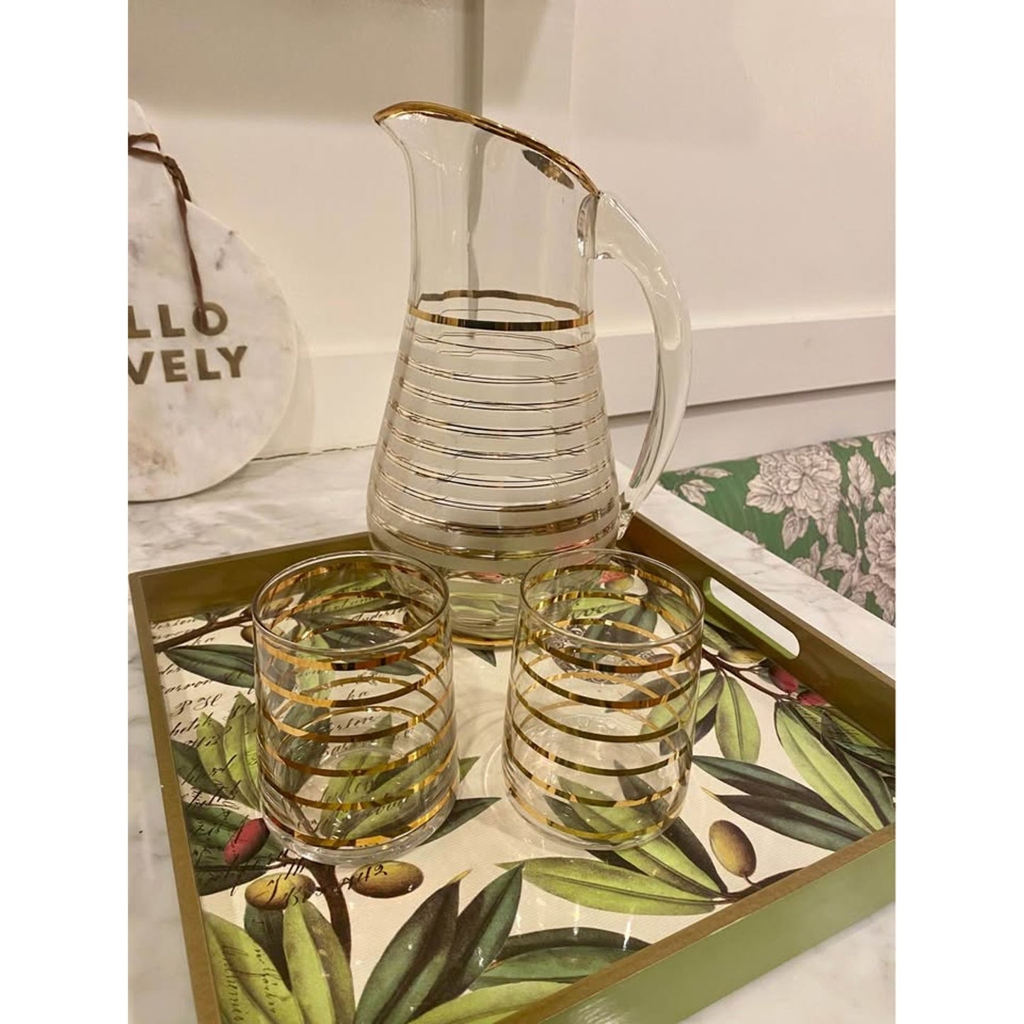 Vintage mid-century modern clear glass pitcher with gold stripes and 2 matching glasses